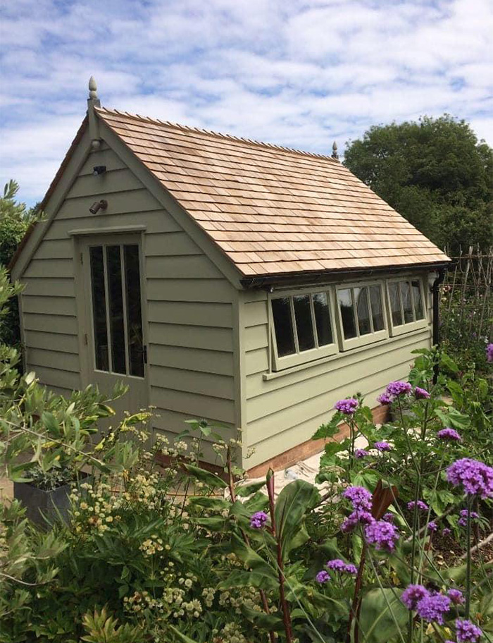 Garden shed painted green